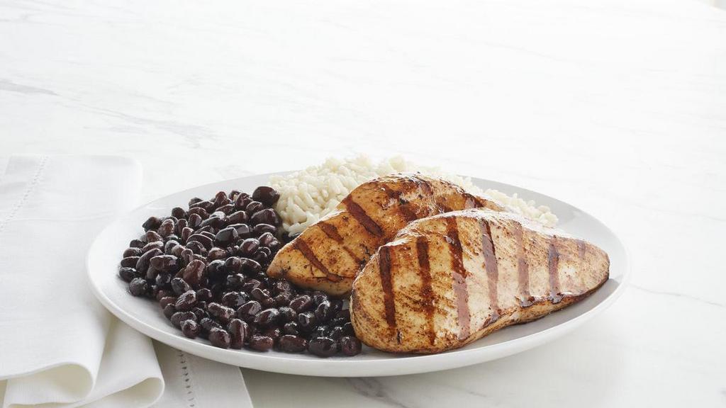 Boneless Chicken Breasts - With Rice & Beans · Two fresh skinless, boneless all-white meat chicken breasts marinated in our citrus blend, then grilled for a super tasty, low-fat meal.