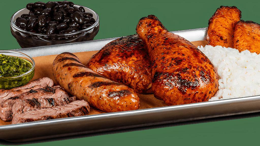 Grillmaster Trio · This platter of grilled favorites features Churrasco Steak with Chimichurri, ¼ Citrus-Marinated Chicken & a Fire-Grilled Chicken Chorizo, served with Rice, Beans and Plantains.