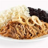 Mojo Roast Pork - With Rice & Beans · Slow roasted in a mojo juice blend, our pork is a moist and tender marvel crowned with sauté...