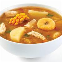 Pollo'S Chicken Soup - Bowl · A steaming bowl of chicken soup made with corn, yuca, pumpkin, plantains, and grilled chicke...