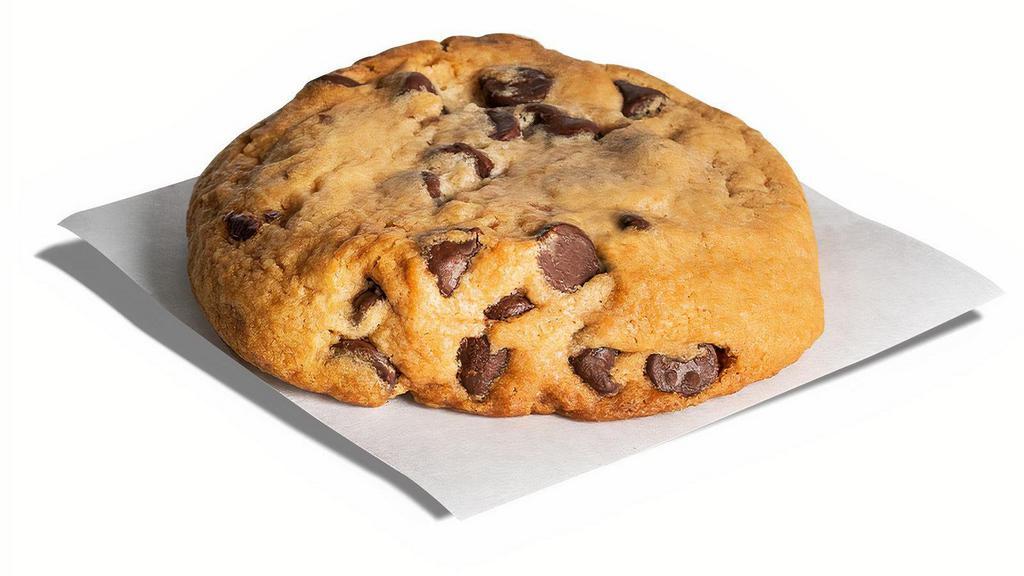 Freshly Baked Chocolate Chip Cookie · A chocolate chip cookie that is deliciously sweet and full of chocolate chips. Everyone needs a simple yet amazing freshly baked cookie as dessert now and then!