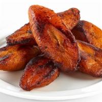 Sweet Plantains · Perfectly ripe, sweet plantains, cooked to a golden caramelized finish.