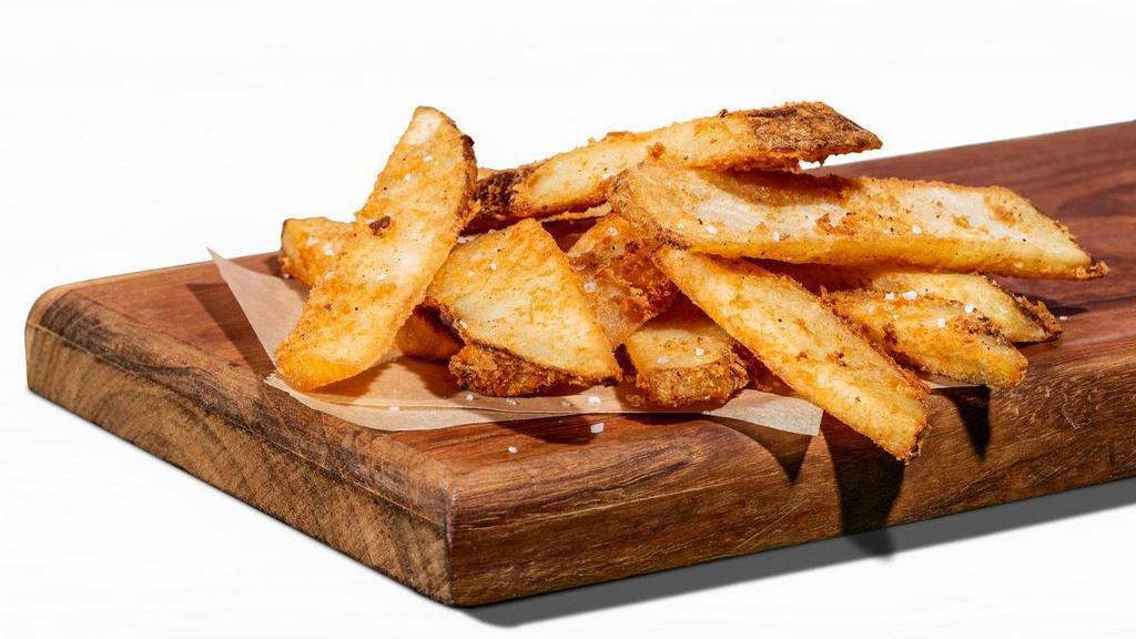 French Fries · Fresh cut potatoes with skin on, fried to a golden crisp