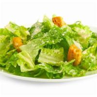 Caesar Salad · Pollo Tropical's original Caesar dressing recipe and zesty croutons tossed in romaine lettuc...