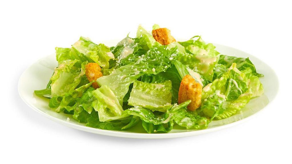 Caesar Salad · Pollo Tropical's original Caesar dressing recipe and zesty croutons tossed in romaine lettuce, Parmesan cheese and grilled chicken breast.