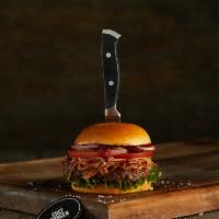 Pulled Pork Burger · Black Angus ground burger, pulled pork on a brioche topped with red onions, lettuce, tomatoe...