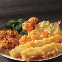 Deluxe Seafood Platter · For those seeking seafood variety, we combine two fish fillets, six shrimp, two seafood stuf...