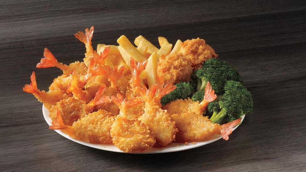 15 Piece Butterfly Shrimp Meal · A plentiful portion of our butterfly shrimp served with your choice of two sides and hush puppies.