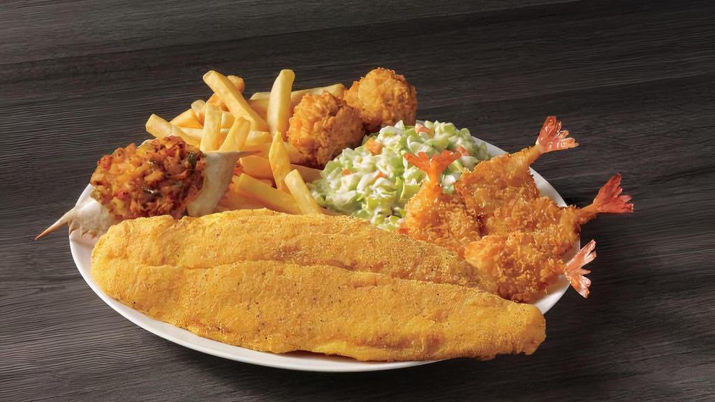 White Fish, Shrimp, & Crab Meal · Our southern-style white fish, four butterfly shrimp and a stuffed seafood crab shell served with your choice of two sides and hush puppies.