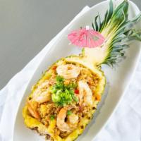 Shrimp Pineapple Fried Rice · Famous fried rice with egg, onions, chopped bell peppers, carrots, scallions, and cashew nuts.