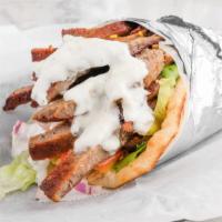 Beef-Lamb Gyro · Beef- lamb meat with lettuce tomatoes, onions & homemade tzatziki sauce.