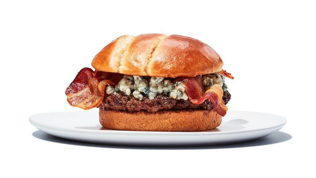 Bacon & Bleu Burger · One 1/4 lb patty topped with sizzling bacon and bleu cheese crumbles. Includes choice of fries.
