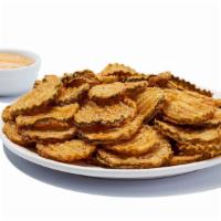 Fried Pickles · Lightly breaded sliced pickles served with our tangy dipping sauce. 1180 cal