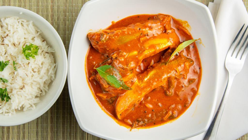 Kottayam Fish Curry · Seasonal fish cooked with Cambodge tamarind and curry leaves.