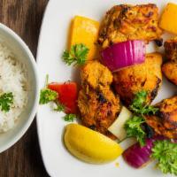 Chicken Tikka · Requires 15 to 20 minutes. Boneless chicken subtly flavored with herbs and spices cooked in ...