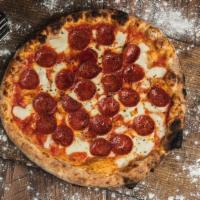 Americana Pizza
 · Hand crush tomato, fresh mozzarella and American pepperoni.