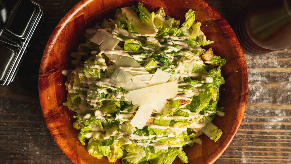 Caesar Salad · Lettuce, Grana Padano shaved, croutons, and dressing. Add Roasted Chicken for an additional charge.