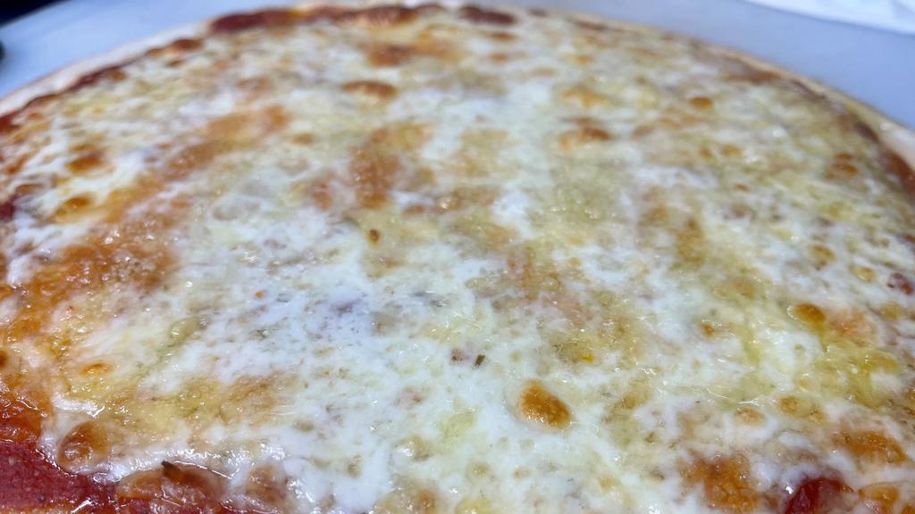 Pizza Margherita · Tomato sauce, oregano, mozzarella, black pepper, extra virgin olive oil