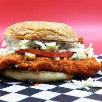 Buffalo Soldier · Panko-crusted chicken breast, Cluck’s original buffalo-style sauce, blue cheese crumbles, le...