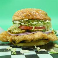 Pig Tenderloin · Indiana State Fair-style pork tenderloin, lettuce, tomato, pickle chips, red onion, and mayo
