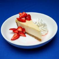 Strawberry Cheesecake · Gluten Free Friendly New York style cheesecake topped with a house-made strawberry sauce and...