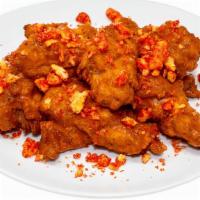Flamin' Cheetah · 10 Spicy Wings tossed in Buffalo wing sauce & garnished with Flamin' Hot Cheetos