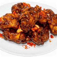 Bbq Flamin' Cheetah · 10 Spicy Wings tossed in BBQ sauce & garnished with Flamin' Hot Cheetos