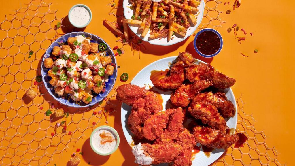 12 Piece Combo · 12 crispy tenders dipped in buttermilk, double-breaded, lightly fried and served with your choice of two sauces for the chicken tenders and... wait a cluckin’ minute... you also get two choices of tots that are hot to trot. Really.