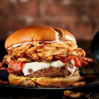 Mushroom Swiss Burger · A juicy Chuck Burger with Swiss cheese, smokey bacon, sautéed mushrooms, fried onion tangler...