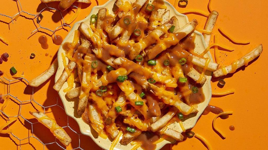 Country Fries · Make 'em country-fied with brown gravy, shredded cheddar & green onions.