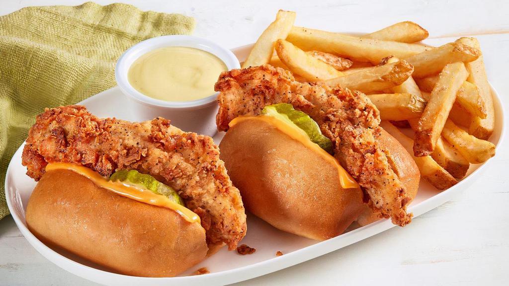 Kids Chicken Tender Sliders · Two Chicken Tenders stuffed in our rolls with pickles, American cheese, and your choice of honey mustard or ranch for dipping. Served with french fries or tots.