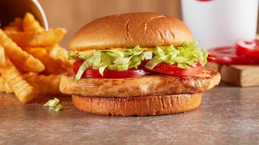 Grilled Chicken Sandwich Meal · Not living the fried life? Try this favorite with grilled chicken, ranch, tomatoes, and crisp lettuce on a toasted potato bun, served with Crinkle Fries and a small sized Coca-Cola Freestyle® drink, over 100 refreshing choices available in-store. (880-1230 Cal)