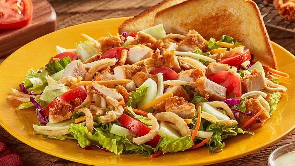The House Zalad® - Fried · Traditional but never boring. Mixed greens, red cabbage, carrots, cucumbers, Roma tomatoes, cheddar and Jack cheeses, fried onions, and Chicken Fingerz™ with Texas Toast. (700 Cal)