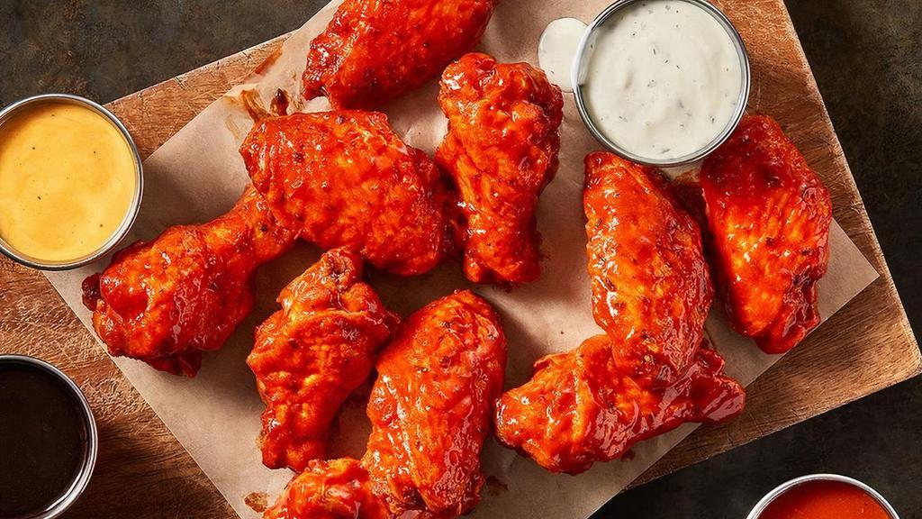 Traditional Wings - 20 · Order them to share, or to keep them all to yourself... we won't judge. Our Traditional Wings, served with Ranch Sauce, tossed in the sauce of your choice. (1910-2310 Cal)