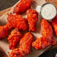 Traditional Wings - 10 · Order them to share, or to keep them all to yourself... we won't judge. Our Traditional Wing...