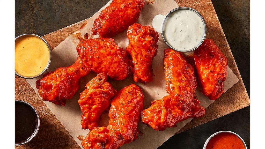 Traditional Wings - 10 · Order them to share, or to keep them all to yourself... we won't judge. Our Traditional Wings, served with Ranch Sauce, tossed in the sauce of your choice. (960-1150 Cal)