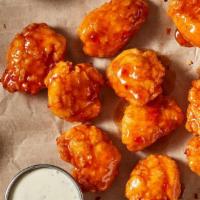 Boneless Wings - 5 · All the flavor, none of the obstructions. Our tender, tasty Boneless Wings, served with Ranc...