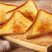 Basket Of Texas Toast · 3 pieces of our thick-cut toast grilled with our signature garlic spread. (450 Cal)