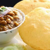 Chole Bhature · 2 bhatures served with chickpea gravy