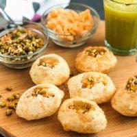 Pani Puri · 7 puri served with mint water, tamarind sauce, and stuffing made of potato and chickpeas