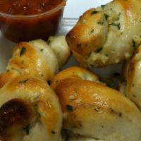 Garlic Knots · With cheese, marinara, and fresh garlic sauce.
