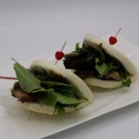 Roast Duck Bun · Roasted duck, hoisin sauce served in Chinese steamed bun and pickled radish.