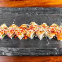 Sexy City Roll · Tuna, salmon, yellowtail, asparagus, and avocado inside topped with seared tuna, salmon, and...