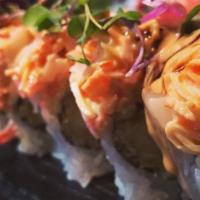 Butterfly Roll · Shrimp tempura and avocado topped with white tuna, crab meat salad, eel sauce, spicy mayonna...