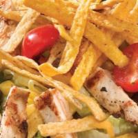 Southwest Salad · Tex-mex-inspired salad featuring freshly chopped romaine, mesquite grilled chicken breast, c...