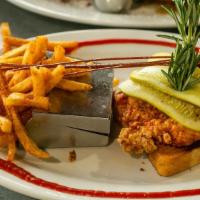 Nashville Hot Chicken Sandwich · Andy's famous fried chicken, dipped into our super spicy Nashville sauce. Served open faced ...