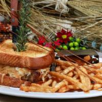 The Kokomo · Our famous HH griddled meatloaf with roasted tomato and smoked mozzarella on old fashioned m...
