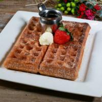 Churro Waffle · Cinnamon & Sugar dusted waffle served with butter and syrup
