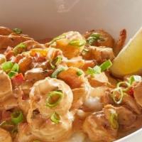 Shrimp 'N Grits - Gluten Friendly · Gulf shrimp and andouille sausage sauteed with red peppers and onions in a spicy low country...
