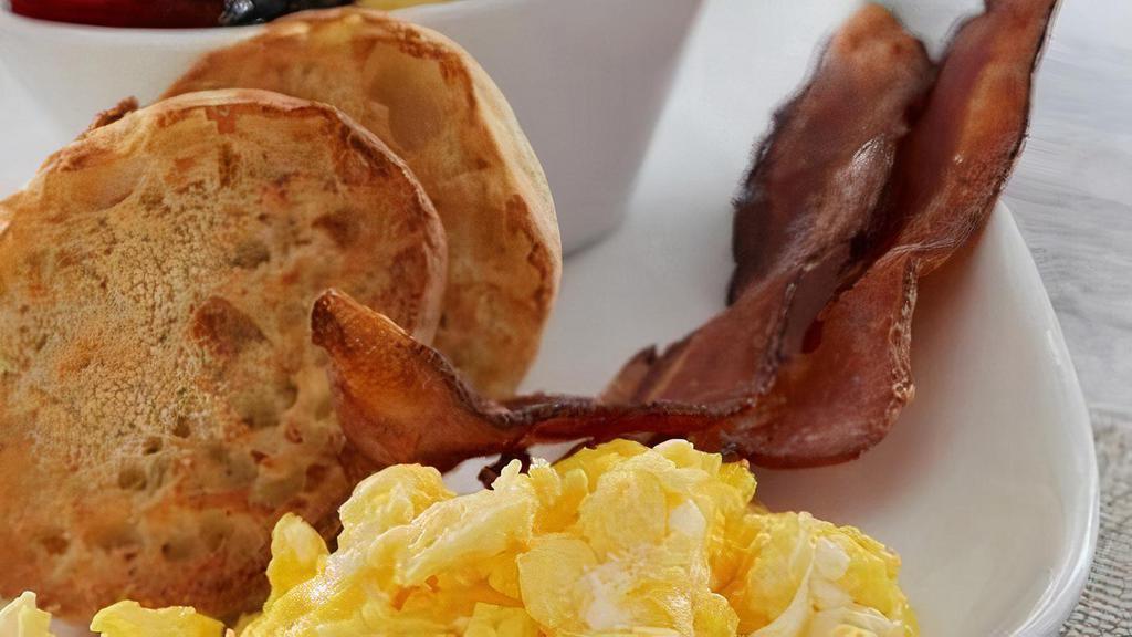 Traditional Day Starter · Two eggs any style with your choice of baked bacon, house-made sausage patties, andouille sausage, maple apple chicken sausage or sweet ham.  Served with an English muffin.